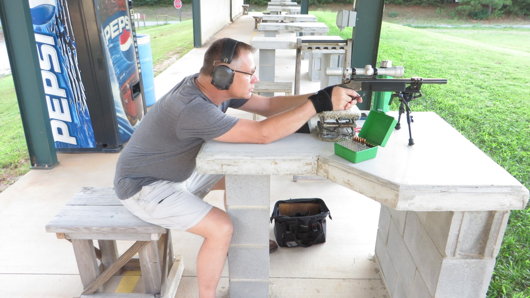 Shawn Risdon perforates the groundhog at 300 yards.  "If I just line 'em up right, I can take out three with one shot. . ."